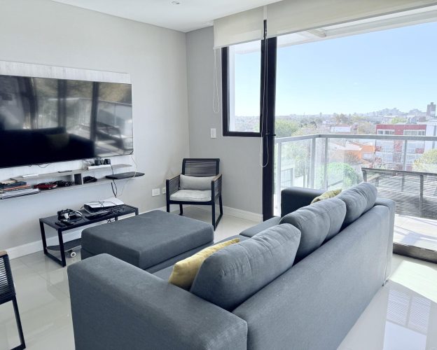 Venta moderno departamento 2 ambientes, Perla Norte, cochera opcional, apto credito